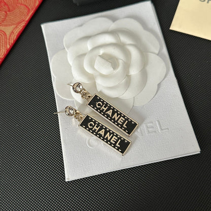 Boucles d'oreilles pendantes Signature Noire