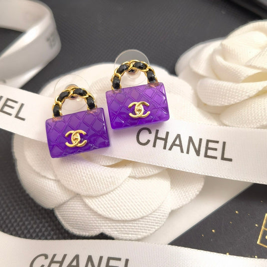 Boucles d'oreilles sac élégantes violettes