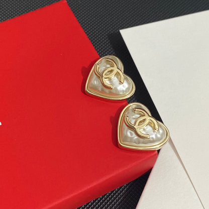 Pendientes de botón con forma de corazón de perla vintage