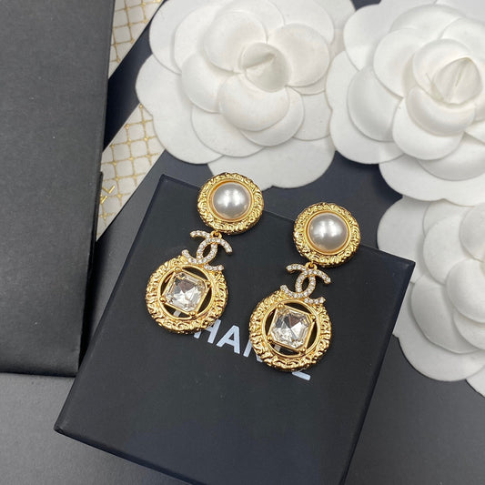 Boucles d'oreilles pendantes élégantes en cristal diamanté