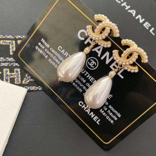Boucles d'oreilles pendantes élégantes en perles initiales