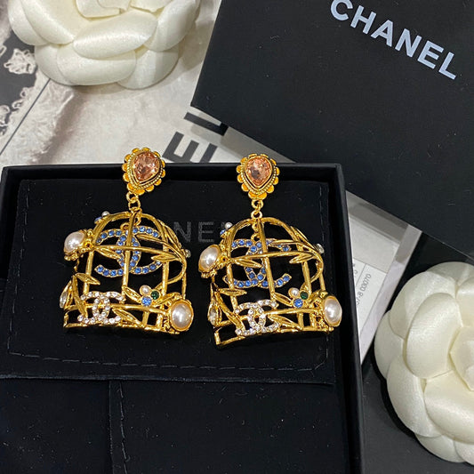Boucles d'oreilles clous Retor Gold Cage à oiseaux