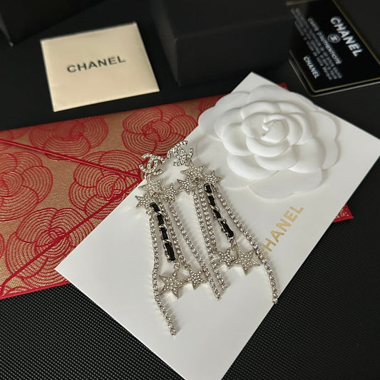 Boucles d'oreilles pendantes longues étoile strass