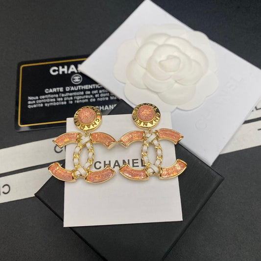 Boucles d'oreilles en cuir brillant à logo