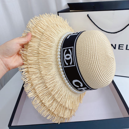 Chapeau de paille à franges et perles