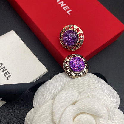 Boucles d'oreilles clous Balle violette lettre creuse