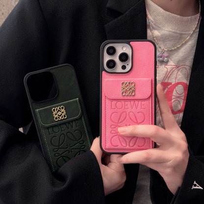 Estuche monedero de cuero repujado