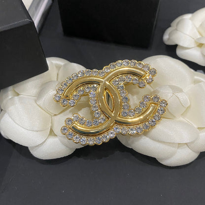 Broche de oro con diamantes de talla brillante de primera calidad