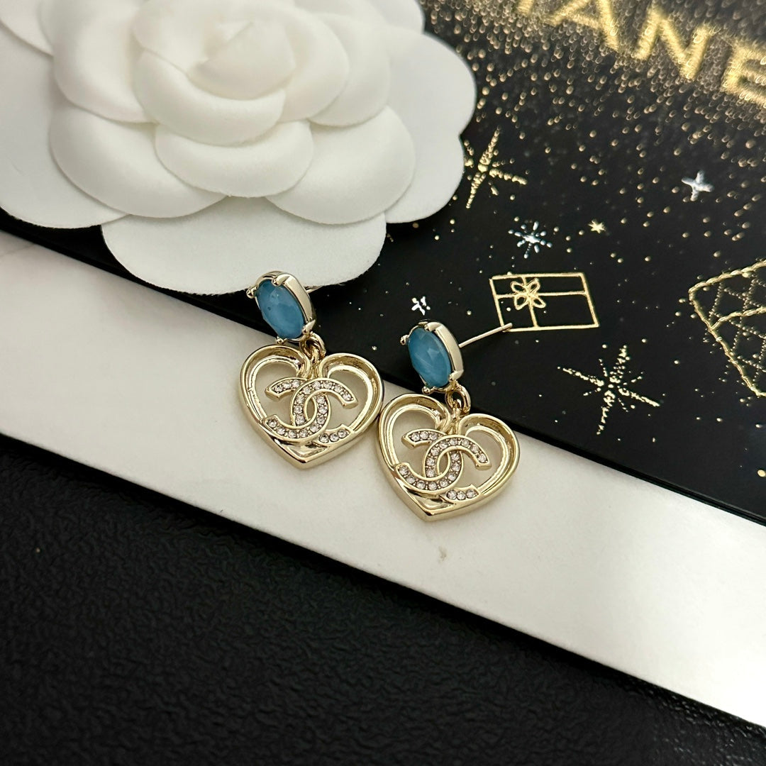 Pendientes vintage de corazón con gema azul