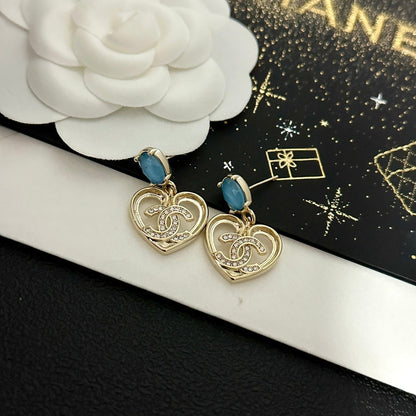 Boucles d'oreilles cœur vintage en pierre précieuse bleue
