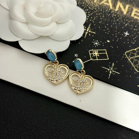 Pendientes vintage de corazón con gema azul