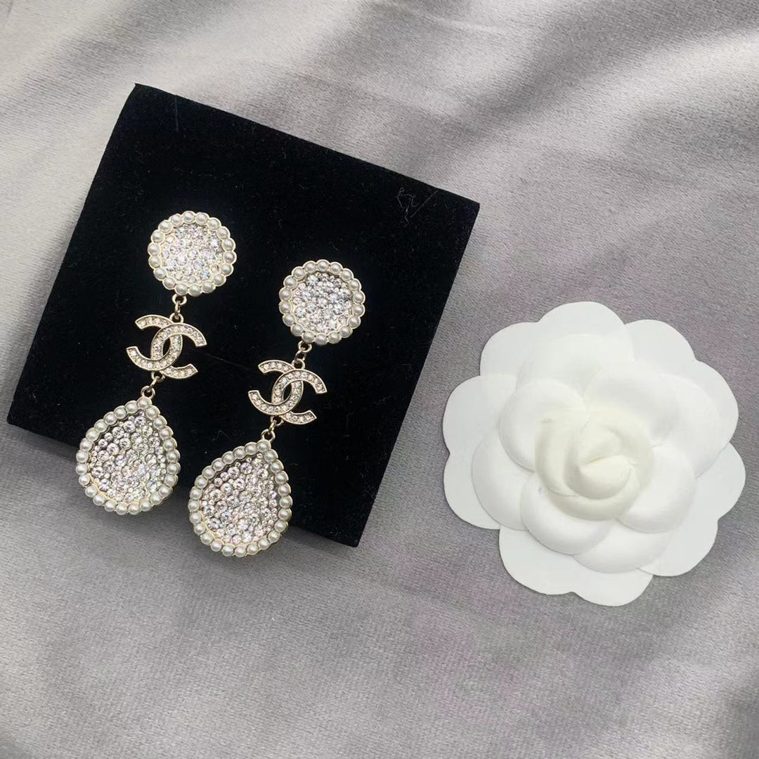 Pendientes de perlas con diamantes completos