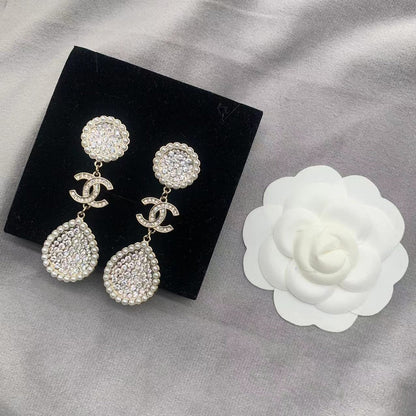 Boucles d'oreilles perles et diamants