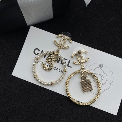 Boucles d'oreilles pendantes Perle et flacon de parfum Lucky 5