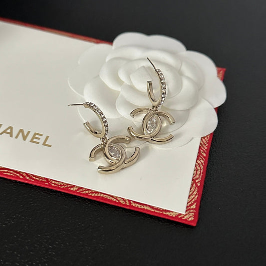 Boucles d'oreilles strass coloris argent