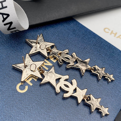 Pendientes colgantes de estrella con diamantes