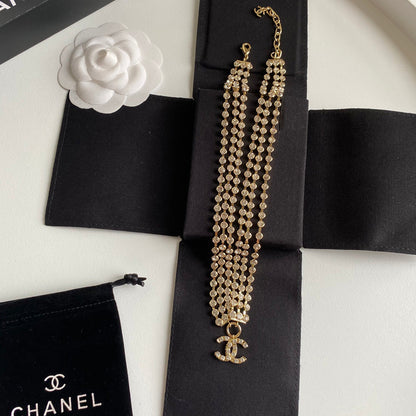 Collier ras du cou en or jaune et cristal