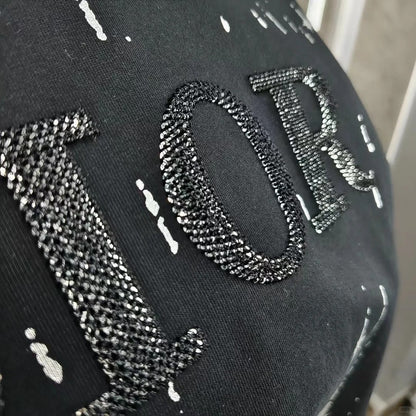 Camiseta holgada de algodón bordado de cuello redondo y manga corta