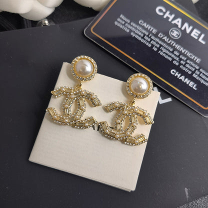Pendientes colgantes de perlas y diamantes vintage