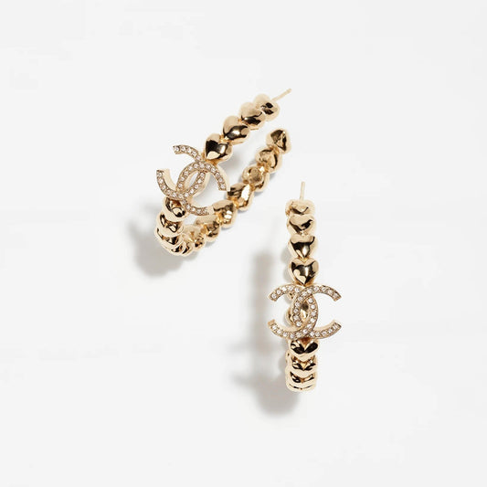 Boucles d'oreilles créoles logo en cristal