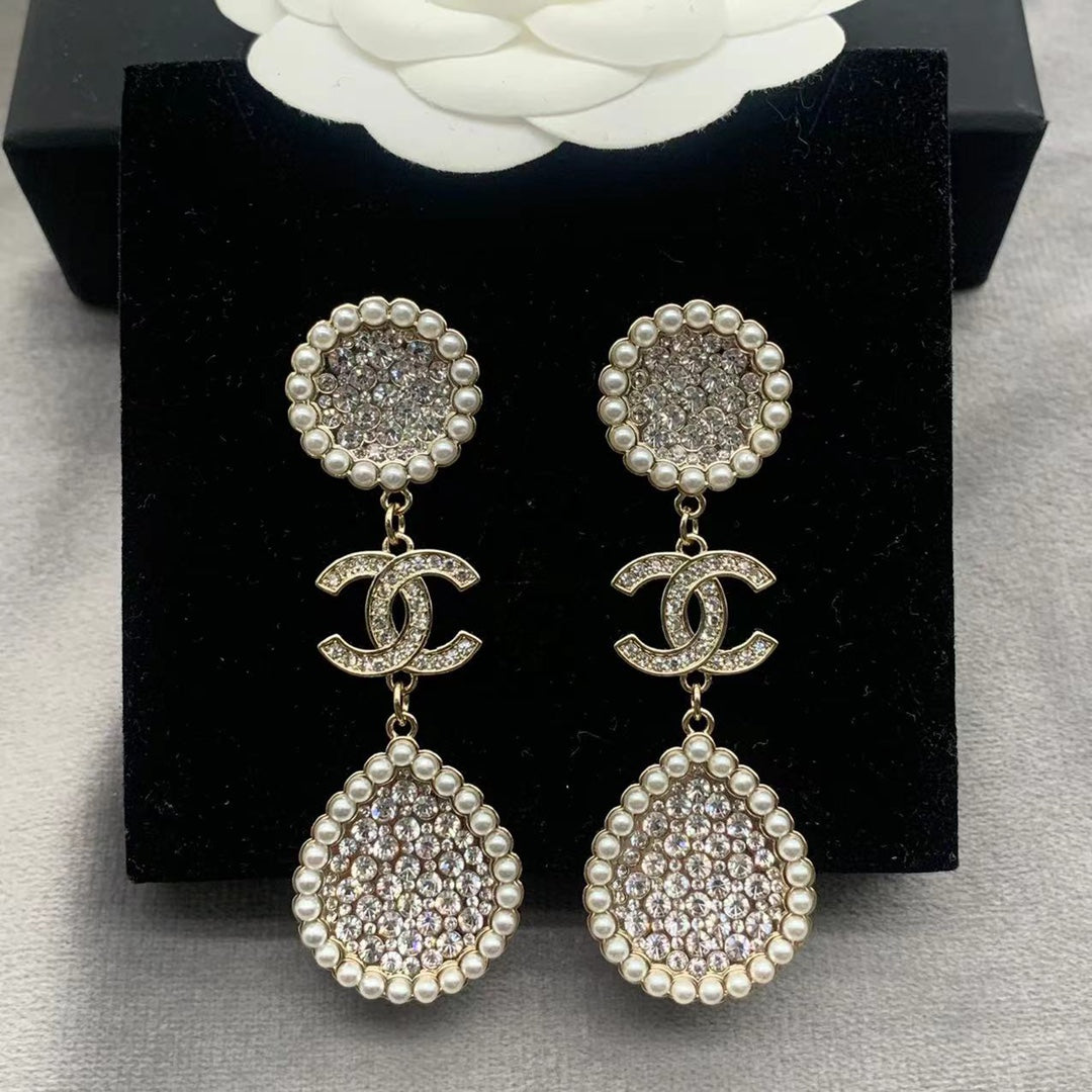 Pendientes de perlas con diamantes completos