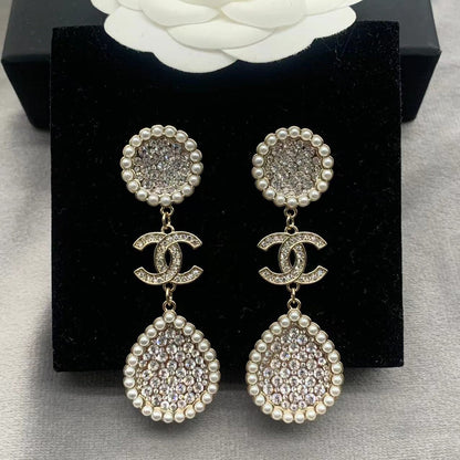 Boucles d'oreilles perles et diamants