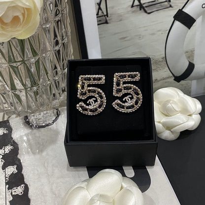Boucles d'oreilles en cuir 5 strass