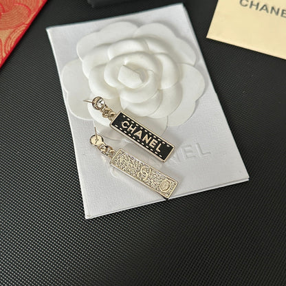 Boucles d'oreilles pendantes Signature Noire