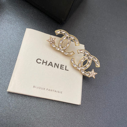 Pendiente clásico de estrella con diamantes de imitación