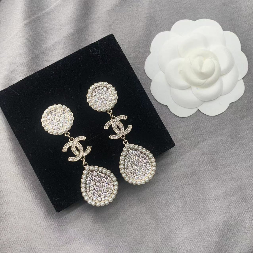 Pendientes de perlas con diamantes completos