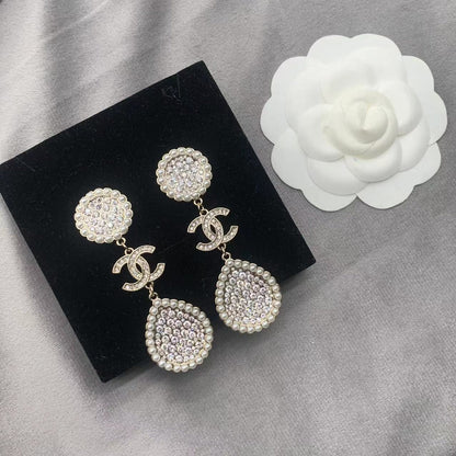 Boucles d'oreilles perles et diamants