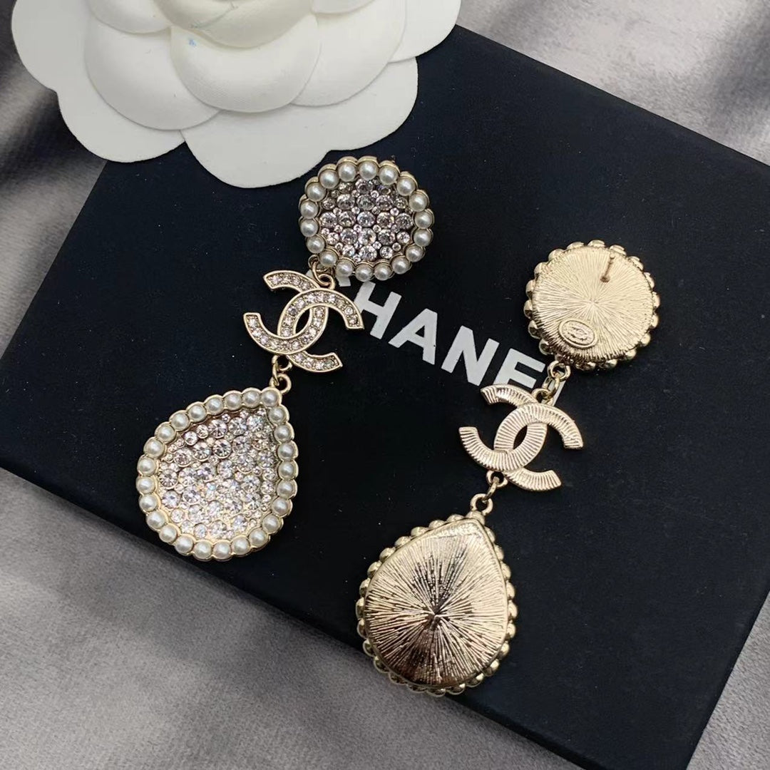 Pendientes de perlas con diamantes completos