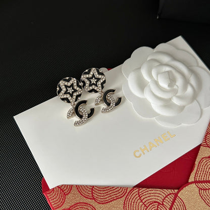 Aretes negros con paneles y diamantes de imitación