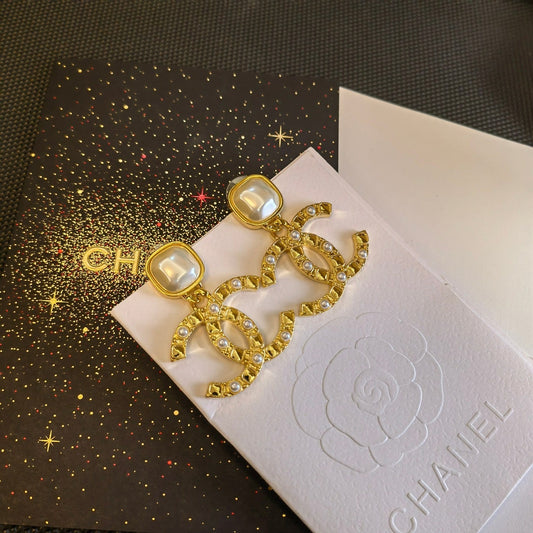Boucles d'oreilles de luxe plaquées or avec perles