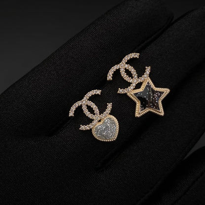 Boucles d'oreilles asymétriques en diamants en forme d'étoile