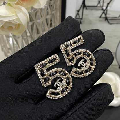 Boucles d'oreilles en cuir 5 strass
