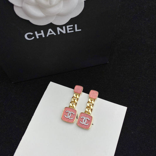 Boucles d'oreilles émaillées rose étincelant