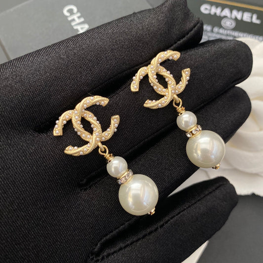 Boucles d'oreilles pendantes perles