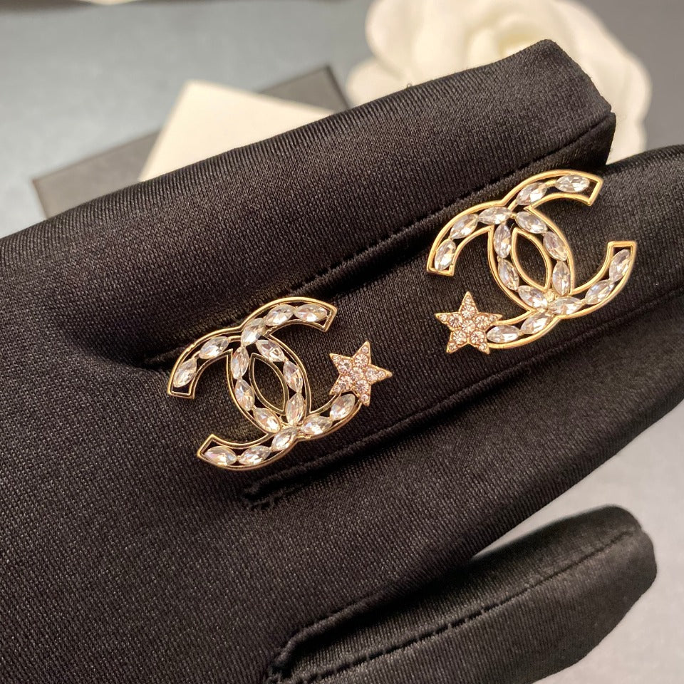 Pendiente clásico de estrella con diamantes de imitación