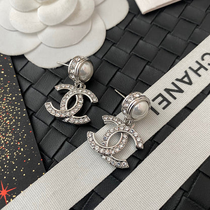 Boucles d'oreilles perles et diamants