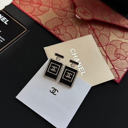 Pendientes de frasco de perfume negro