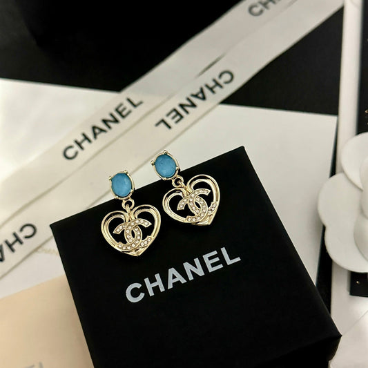 Pendientes vintage de corazón con gema azul