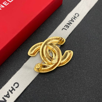 Broche con Patrón de Rombos
