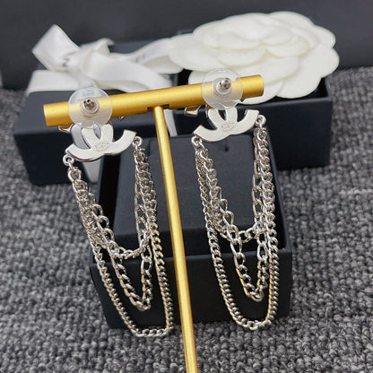 Boucles d'oreilles pendantes chaîne et diamants de cristal