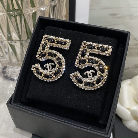 Boucles d'oreilles en cuir 5 strass