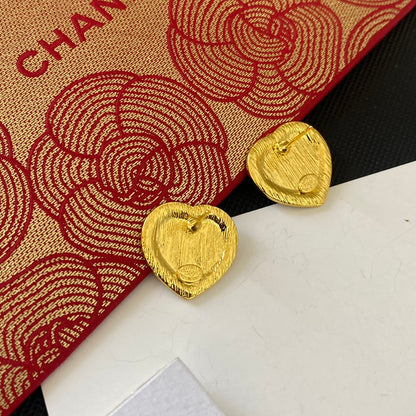 Pendientes de corazón con purpurina