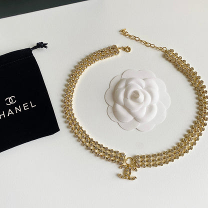 Collier ras du cou en or jaune et cristal
