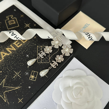 Boucles d'oreilles vintage doubles fleurs strass