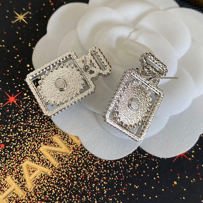 Boucles d'oreilles flacon de parfum en diamant de qualité supérieure
