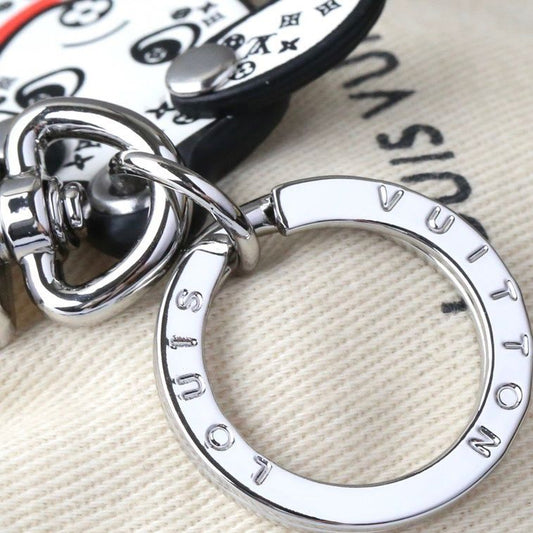Porte-clés créatif chien tacheté blanc